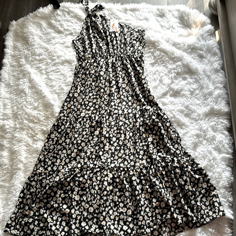 Woman's black one sleeve floral dress. New, never worn.